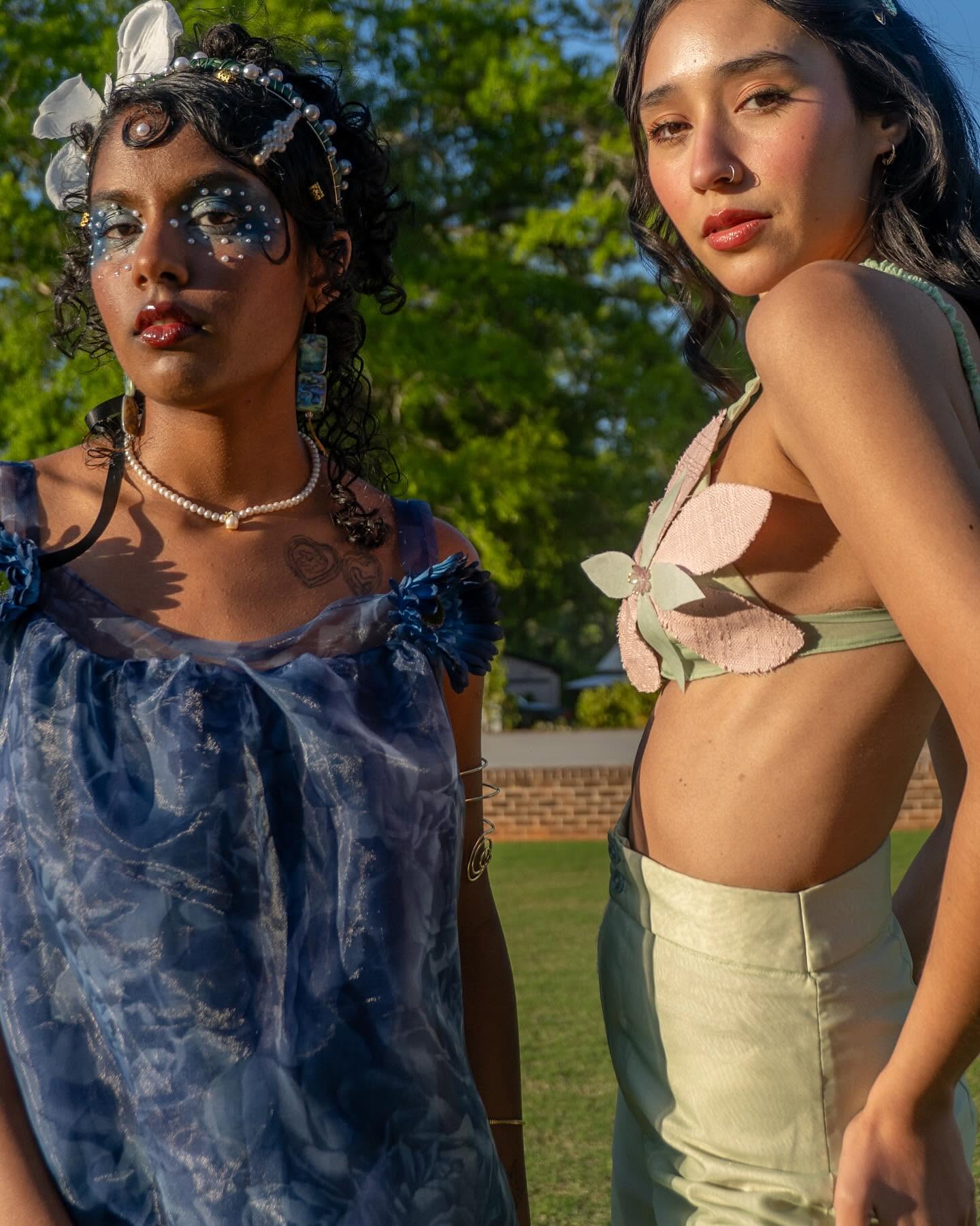 Two FDSA models in embellished blue and pale green looks